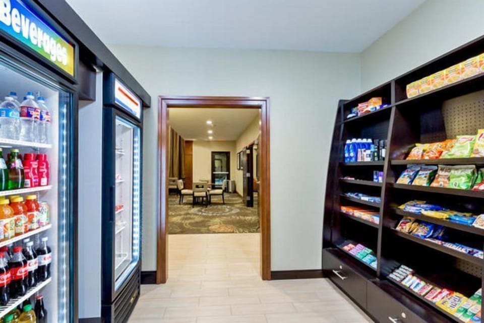 Shelves of packaged snacks and drinks available at the on-site pantry around the clock