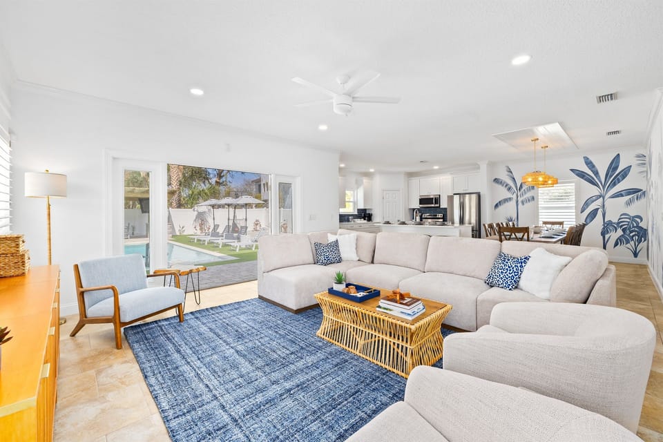 Open-concept living and dining area that flows seamlessly into the kitchen, creating the perfect space for entertaining family and friends.