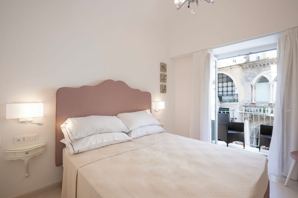 Classic Double Room, Balcony, City View | In-room safe, blackout drapes, soundproofing, free WiFi