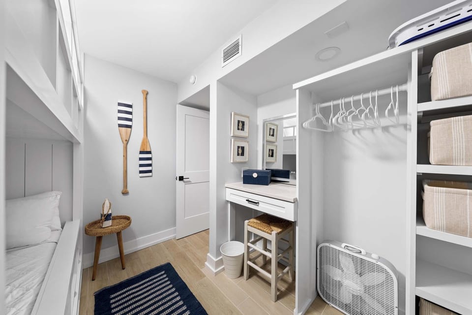 Guest bedroom with queen-over-queen bunk beds