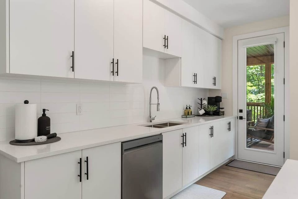 Prepare meals with ease in a modern kitchen equipped with all the essentials and appliances.
