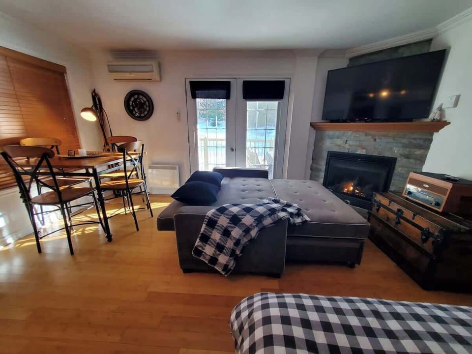 Spacious interior featuring a Double size sleep sofa and Queen size bed.