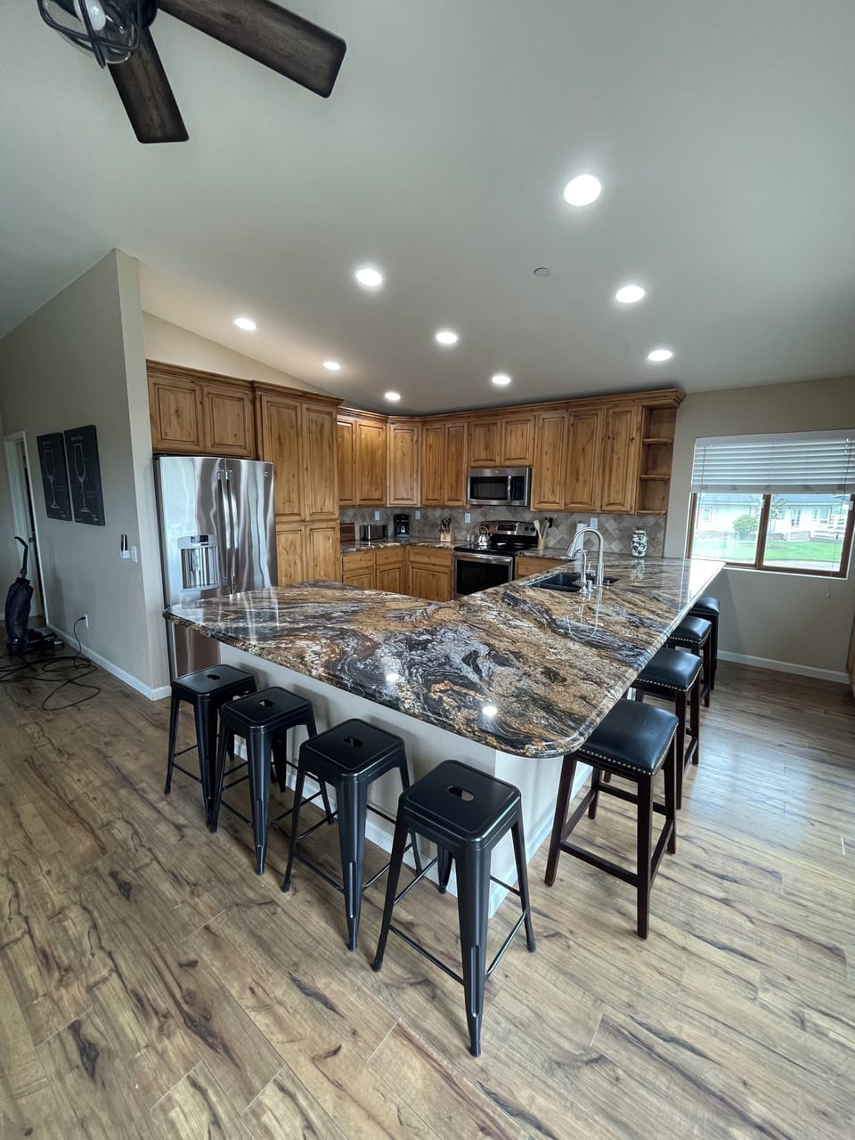 Kitchen with 8 barstools for dining