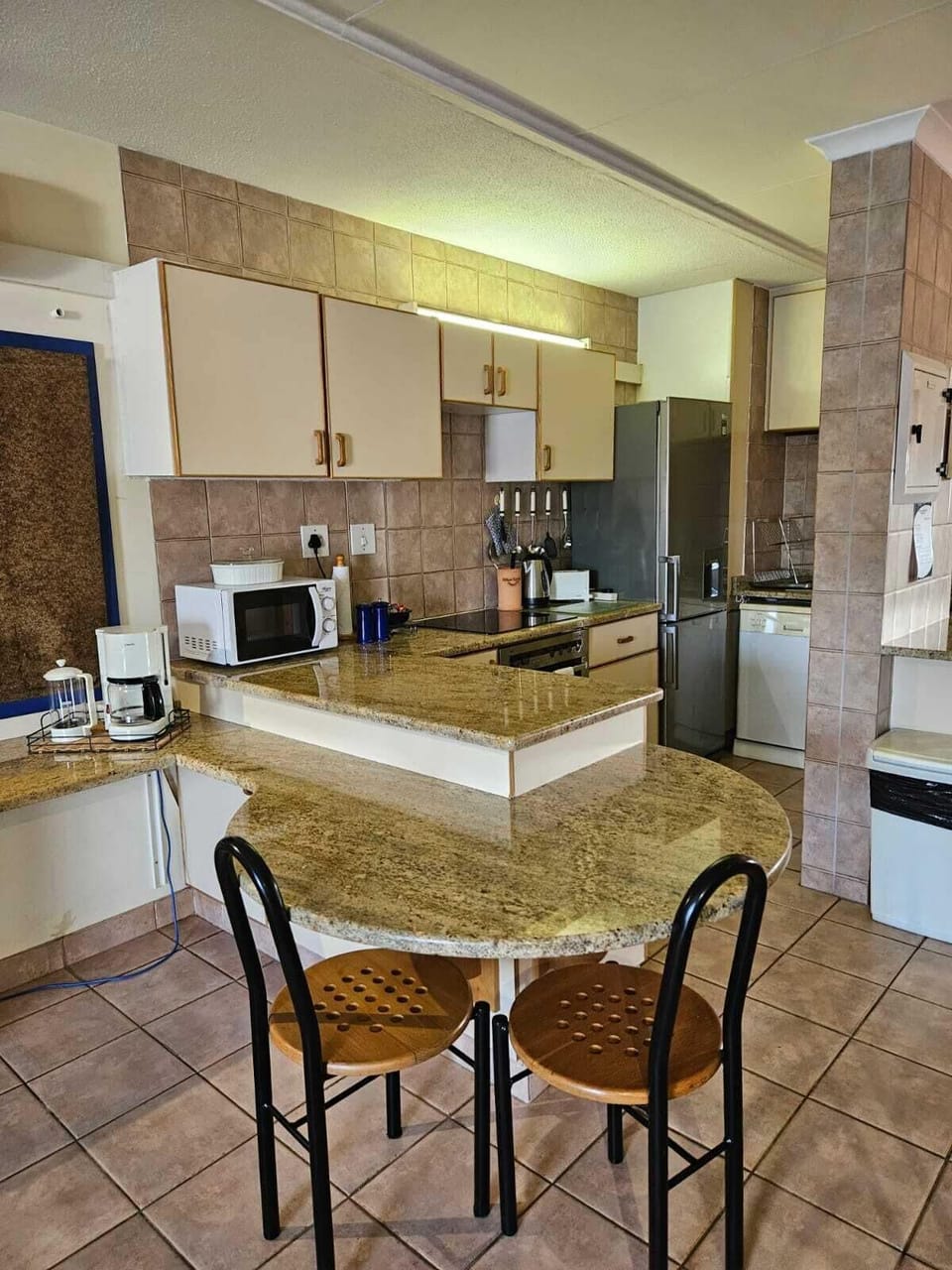 Standard Apartment, Beach View | Private kitchen | Electric kettle, toaster