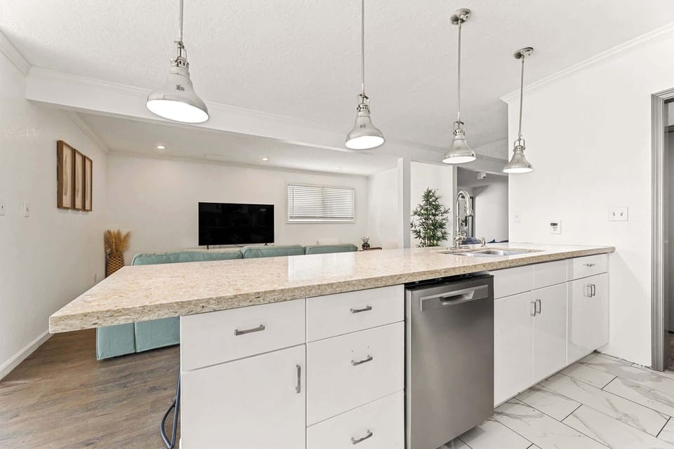 Open concept kitchen with view to the family room