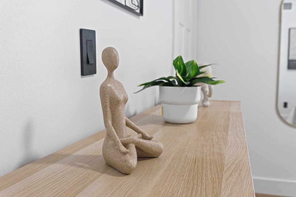 Thoughtful bedroom décor featuring natural wood finishes and calming accents. A serene and stylish touch that enhances the relaxing atmosphere of the space.