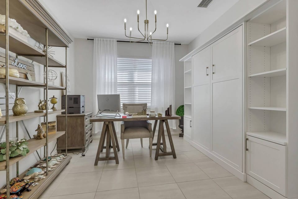 A flex/office space can be used based on your individual needs - its furnished with a work desk, printer, and a full-size Murphy bed.