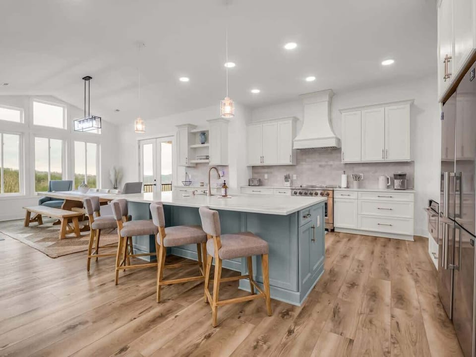 Cook, gather, and celebrate in this stunning open kitchen with a spacious island and elegant finishes. Perfect for family breakfasts, holiday meals, and unforgettable nights together in North Carolina.