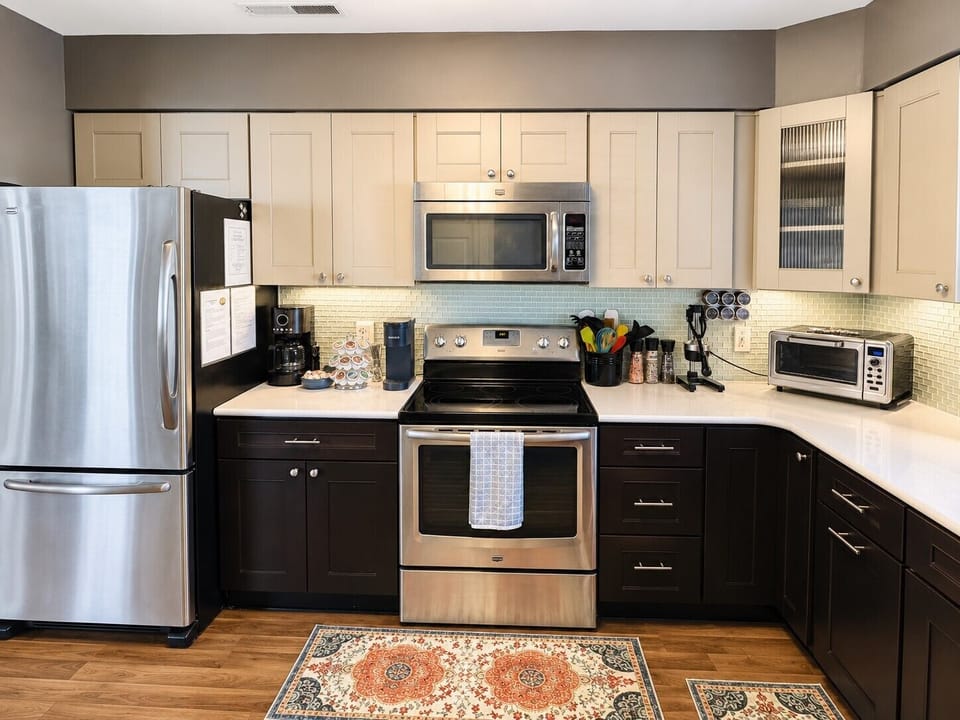 Fully equipped, modern kitchen with stainless appliances