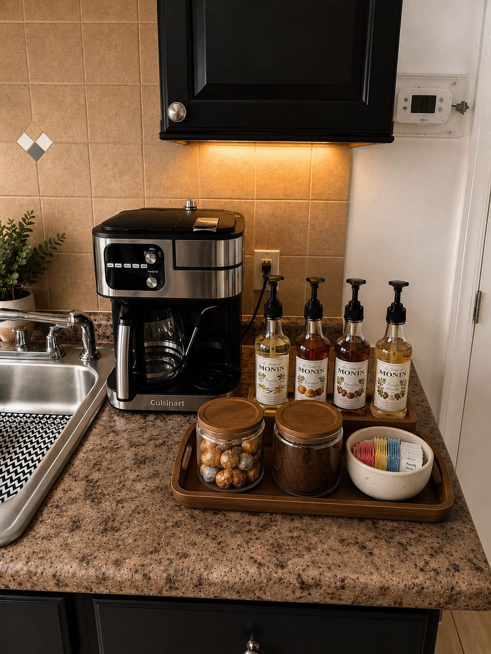 Cozy kitchen coffee bar with flavored syrups and warm ambient lighting