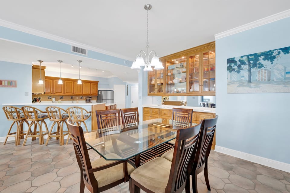 Dining area with a view! Has dining table and 6 chairs. Additional seating for 4 available at the bar area