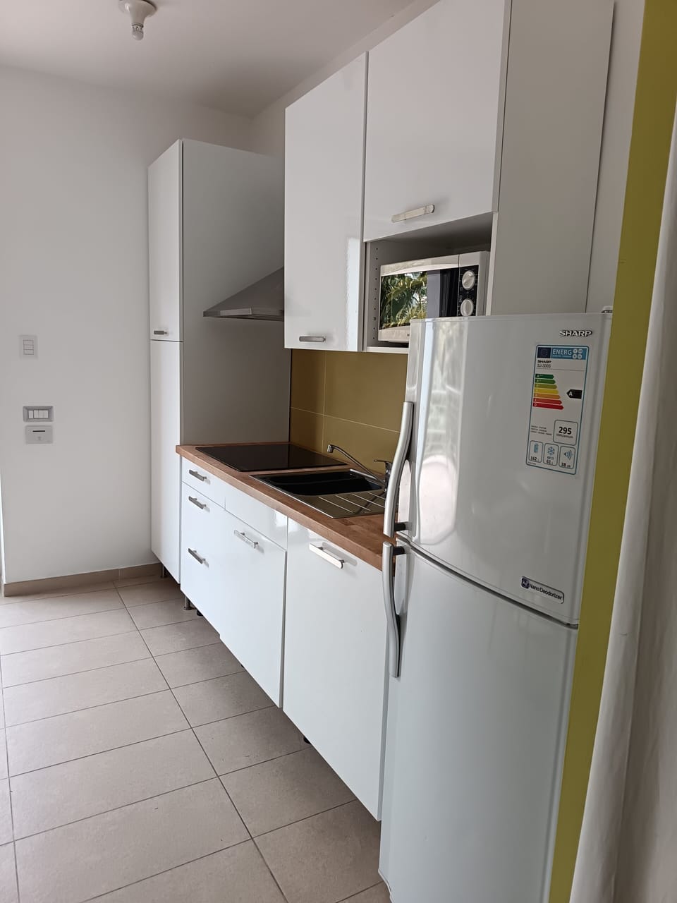 Condo, Kitchen, Sea View | Minibar, in-room safe, blackout drapes, soundproofing