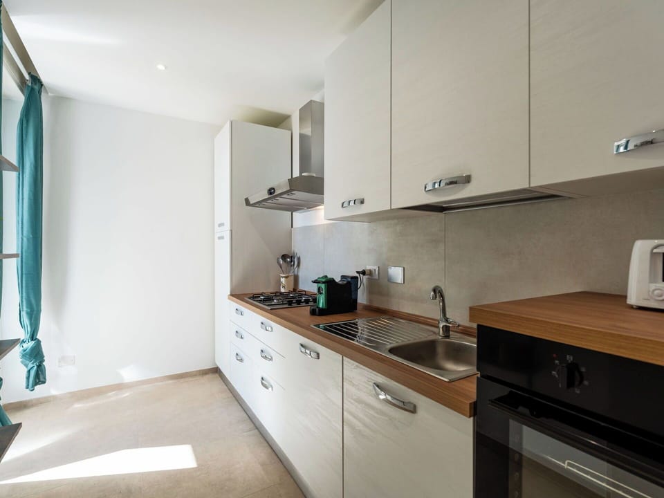 Countertop, Kitchen, Cabinetry, Interior Design, Flooring, Furniture, Kitchen Appliance, Major Appliance, Wood, Floor