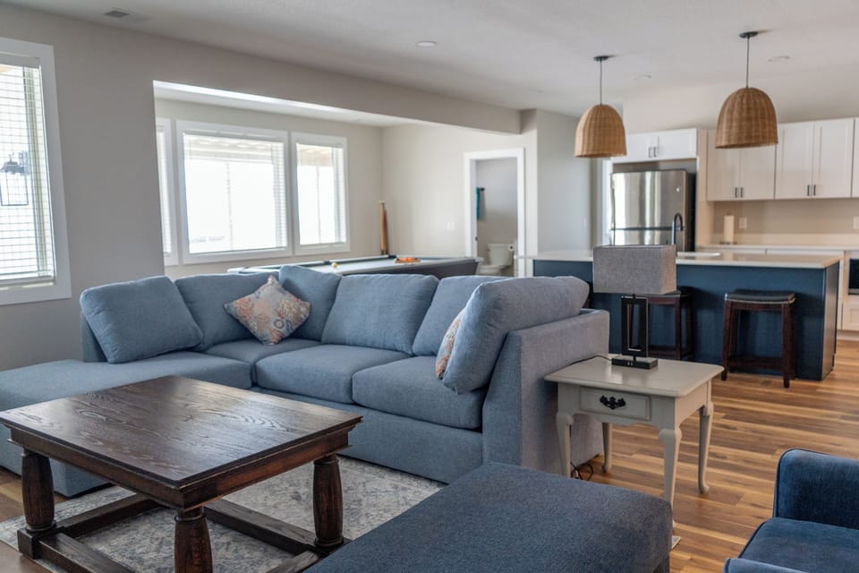Basement Walk Out, Living Area, Full Kitchen and Living Room with pool table.
