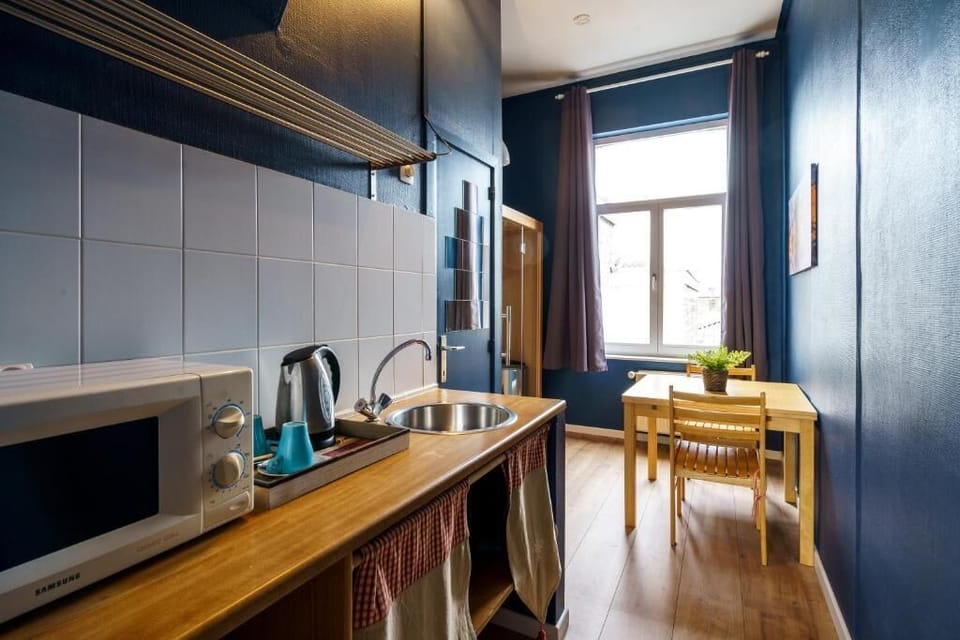 Deluxe Double Room, Canal View | Private kitchen | Coffee/tea maker, electric kettle