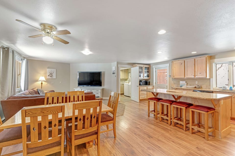 Open concept living, dining, and kitchen