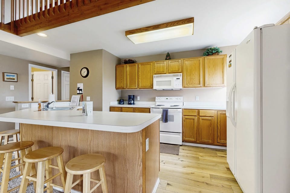 Kitchen with bar seating for 4
