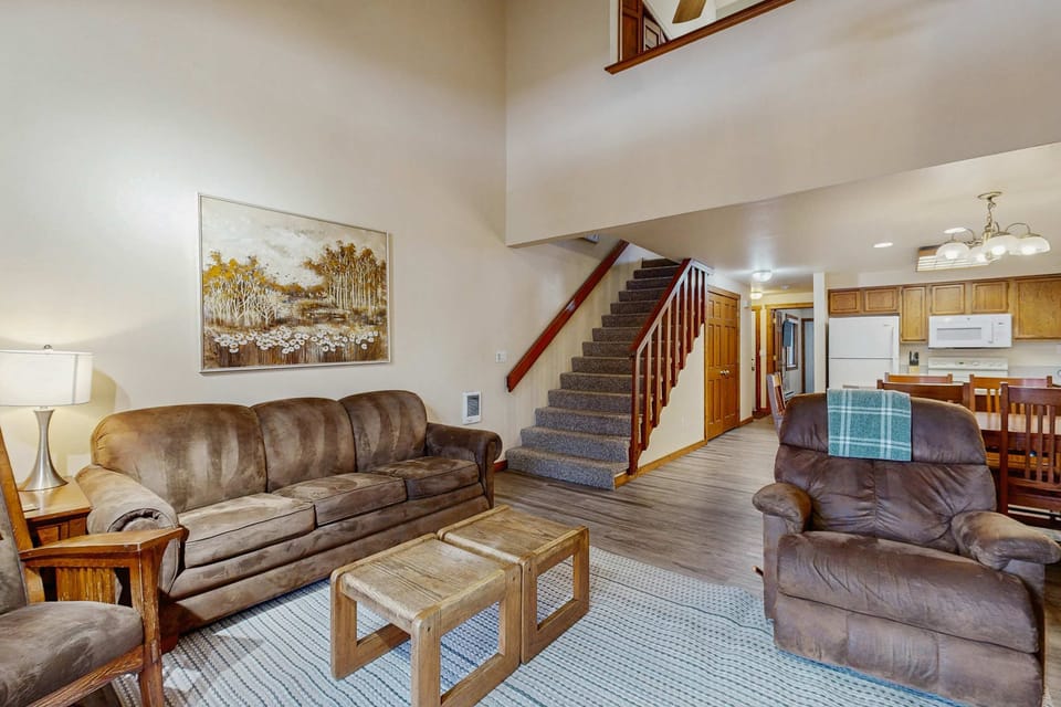 Living room with loft above