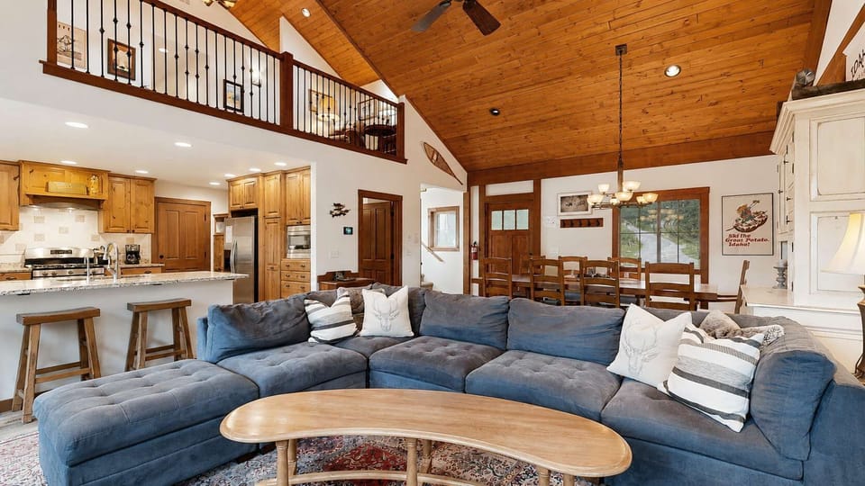 Open concept living with loft above