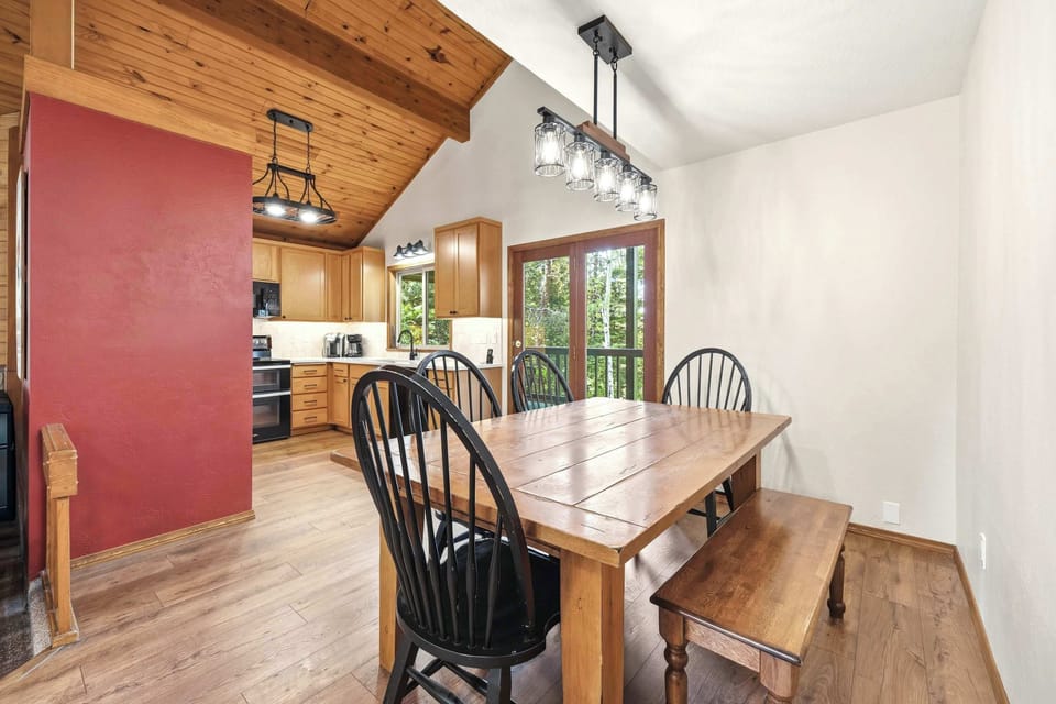 Dining room with kitchen beyond