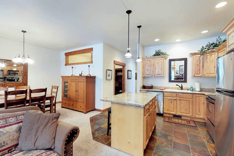 Kitchen from living room with dining room beyond