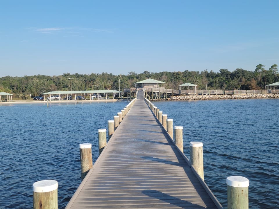 Shoreline Park has disc golf, tennis, kids parks, sand volleyball, pay per visit exercise classes, dog park, boat launch, fishing pier, walking trails, and picnic areas by the beach.