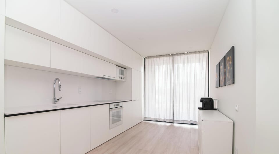 Full-size fridge, toaster, cookware/dishes/utensils, cleaning supplies