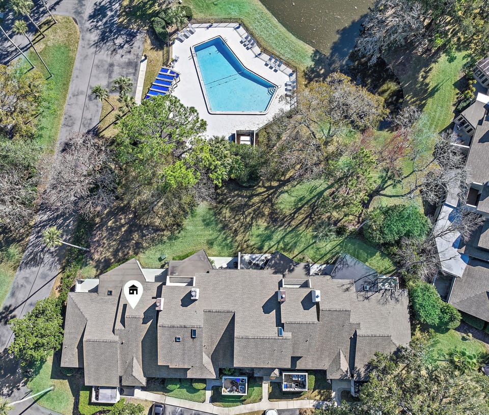 Swimming pool conveniently located overlooking lagoon