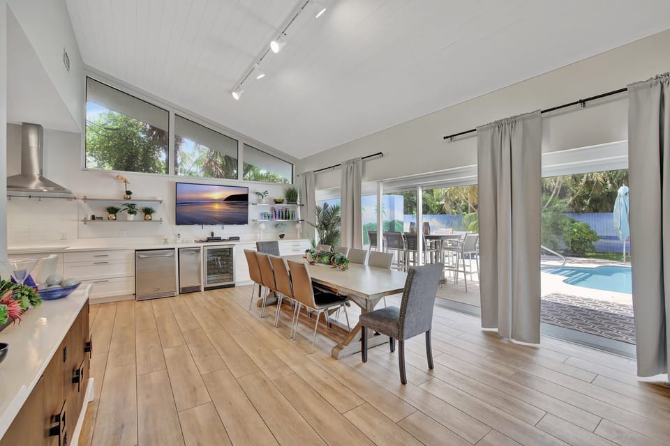 Kitchen and dining, open to the pool terrace.