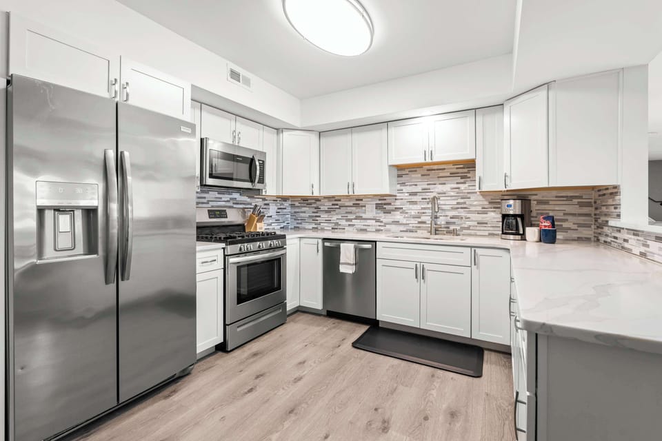 A fully equipped kitchen allows for ample space to cook up a large family recipe. - The Solstice - Lake Ozark, MO