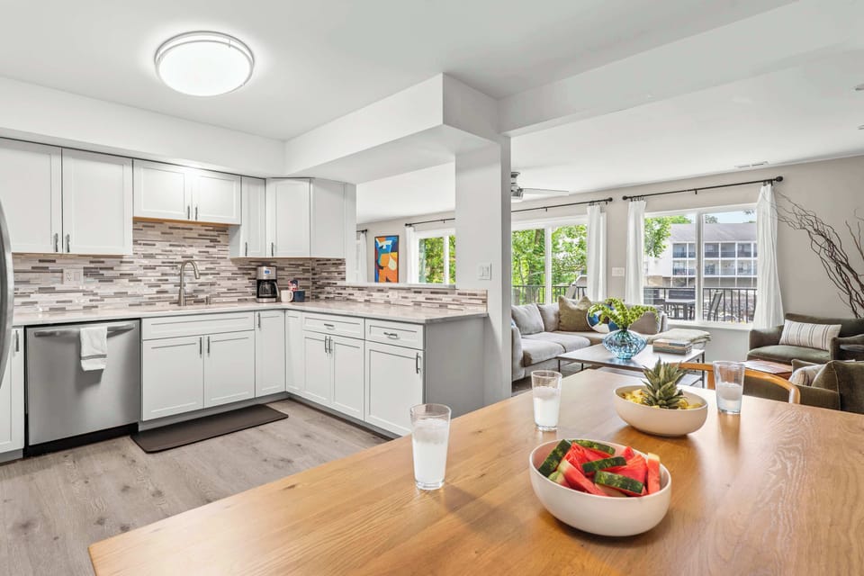 The open concept allows you to interact with all your friends and family with ease. - The Solstice - Lake Ozark, MO