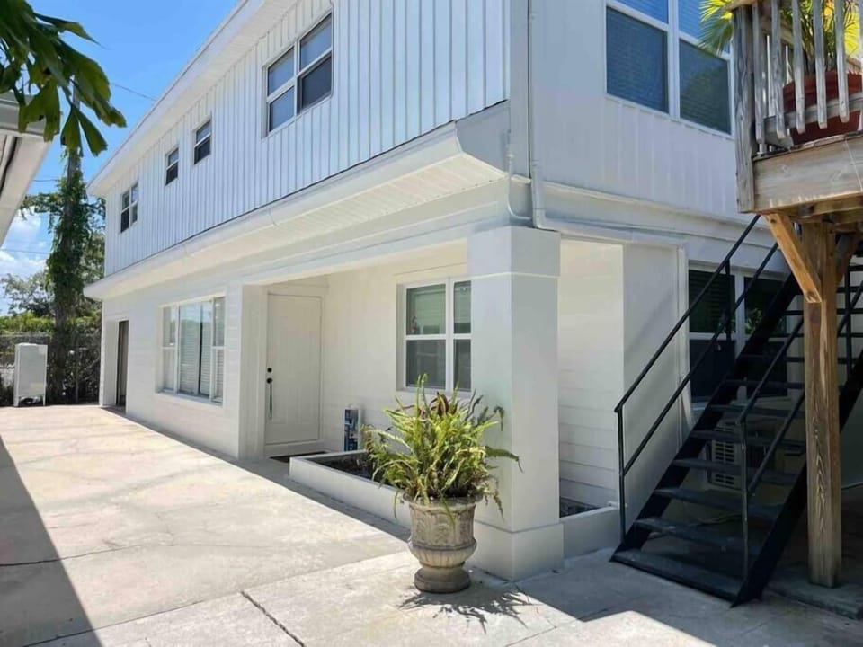 The stairway on the back building at the end of our courtyard that leads up to Unit A.