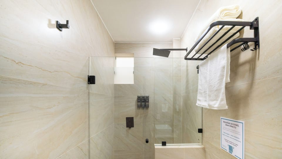 Comfort Room, Patio, Courtyard View | Minibar, in-room safe, desk, laptop workspace