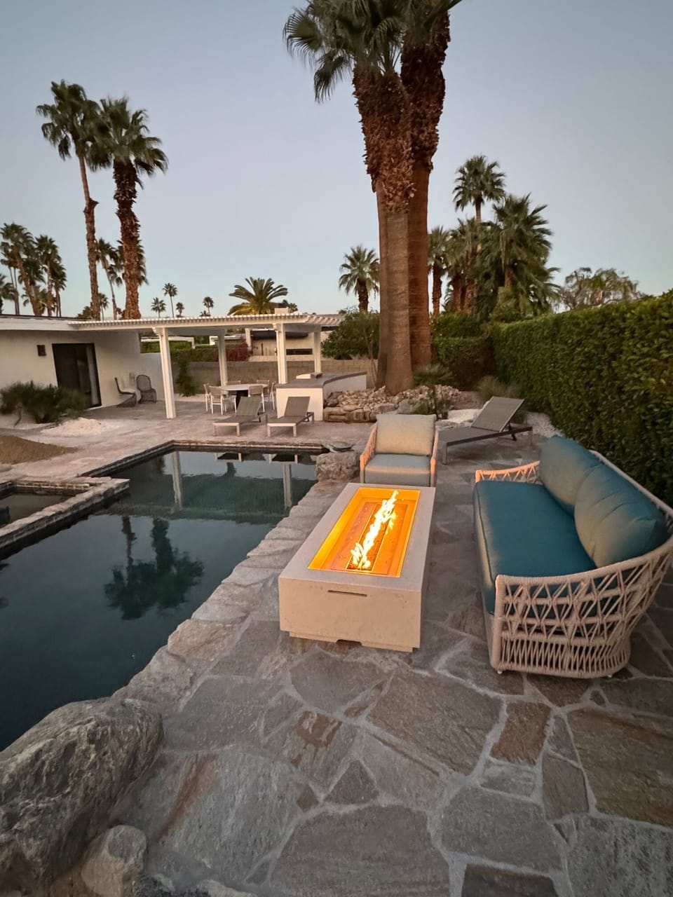 Outdoor fire lounge , large pergola for outdoor dining.