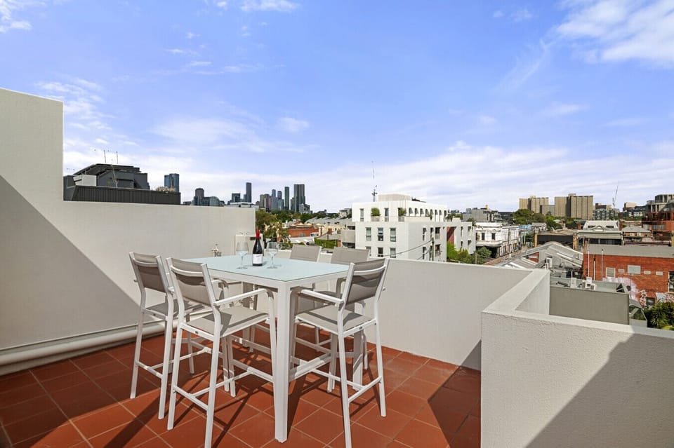 Have a drink on your private rooftop with views across Melbourne