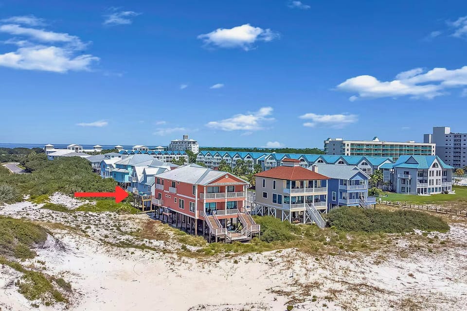 One home back from beachfront, enjoy spectacular access and gorgeous views.