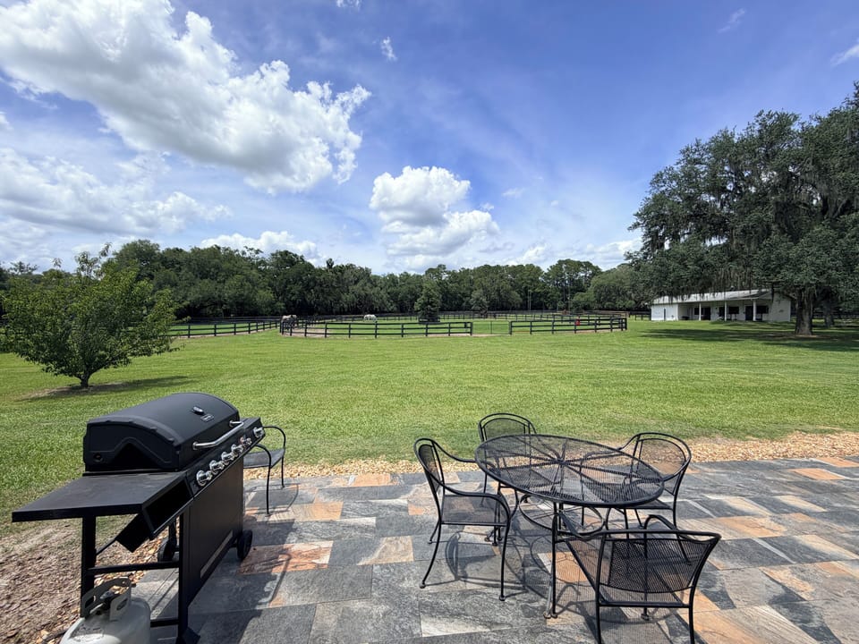 View from family room with outdoor eating.