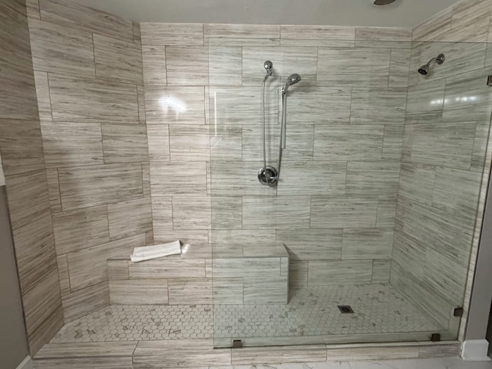Primary bathroom shower , double shower heads