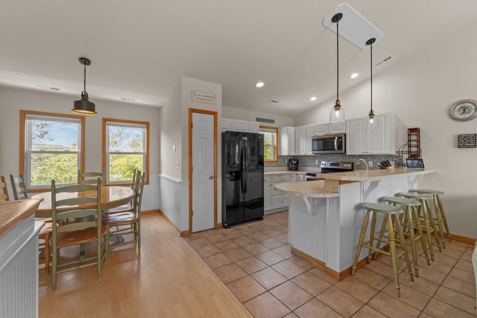 Open kitchen overlooking  Great Room. Half bath located off of dining area.