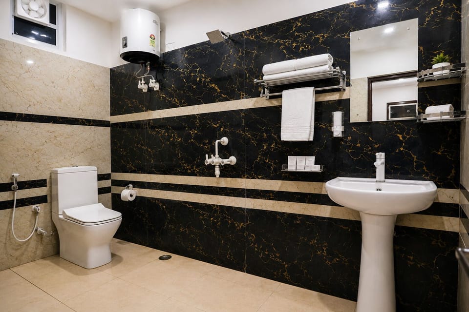 Shower, bidet, towels, soap