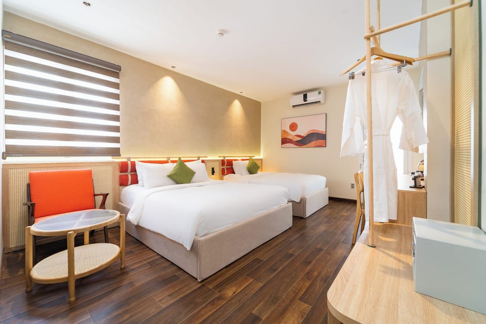 Family Triple Room | Premium bedding, minibar, in-room safe, blackout drapes