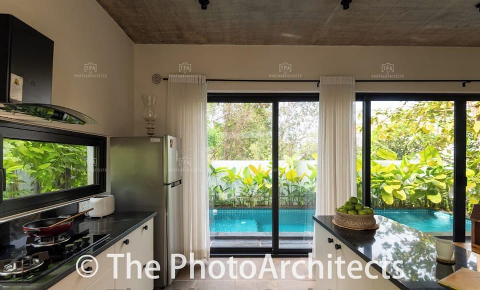 Villa, Balcony, Pool View | Private kitchen