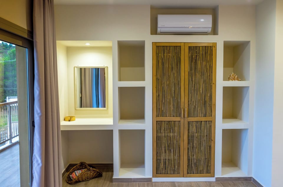 Junior Suite, Balcony, Sea View | In-room safe, soundproofing, iron/ironing board