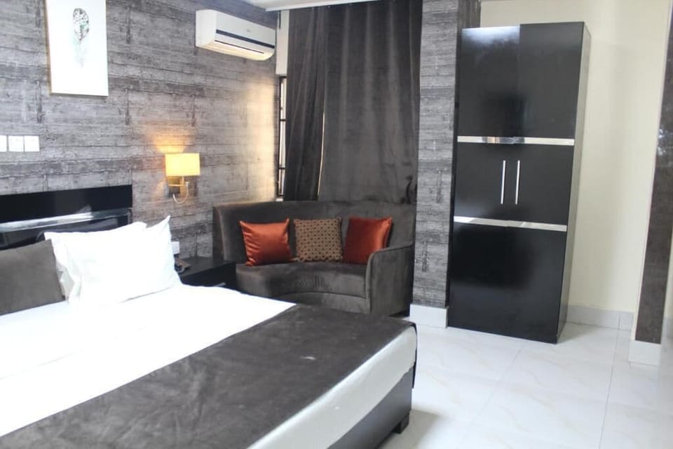 Deluxe Room, Balcony, City View | Desk, laptop workspace, blackout drapes, soundproofing