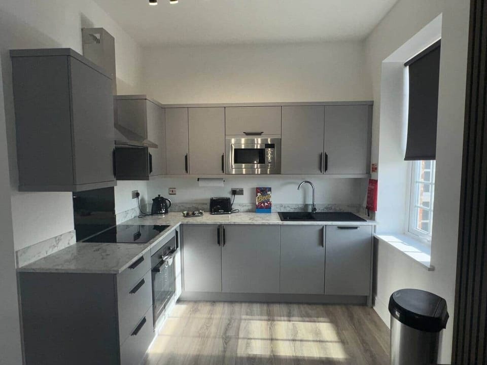 fully fitted kitchen with all basic equipment  for cooking, microwave, dishwasher, fridge  freezer
