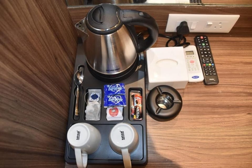 Deluxe Double Room, Private Bathroom | Coffee and/or coffee maker