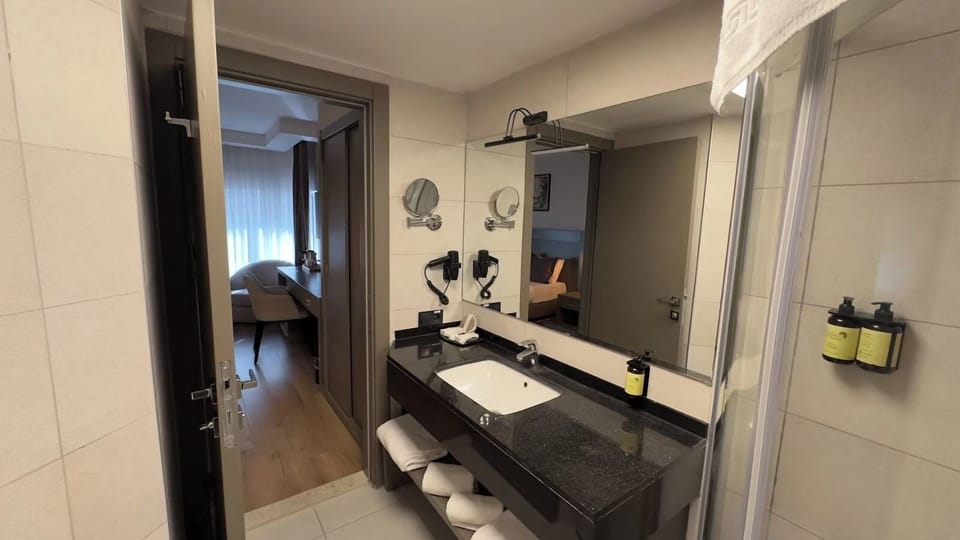 Hair dryer, slippers, towels, soap