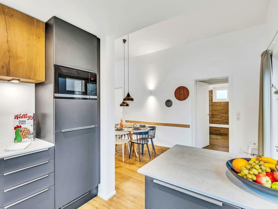 Kitchen Appliance, Interior Design, Kitchen, Furniture, Flooring, Major Appliance, Countertop, Wood, Home Appliance, Cabinetry