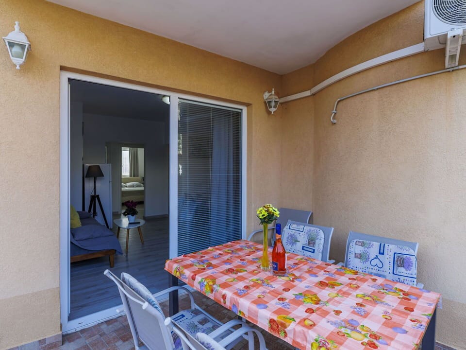 Furniture, Floor, Flooring, Door, Chair, Outdoor Furniture, Wood Stain, Kitchen & Dining Room Table, Shade, Coffee Table