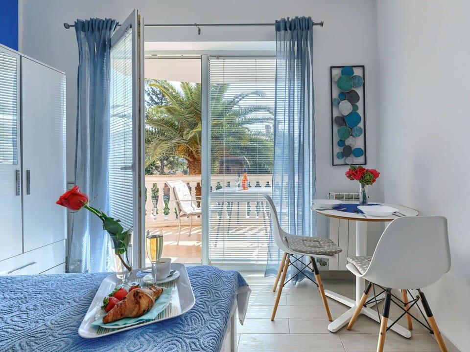 Furniture, Interior Design, Chair, Window Covering, Apartment, Shade, Resort, Eco Hotel, Window Treatment, Houseplant